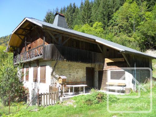 A character property in need of renovation, situated on a sunny plot with great views.  