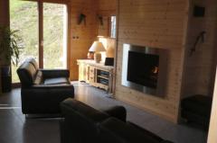 Chalet Les  Eaux Tortes - The louge area with built-in fire